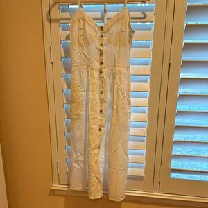 Brand new Rolla’s linen midi dress with pockets.